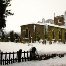 Nearby church in snow